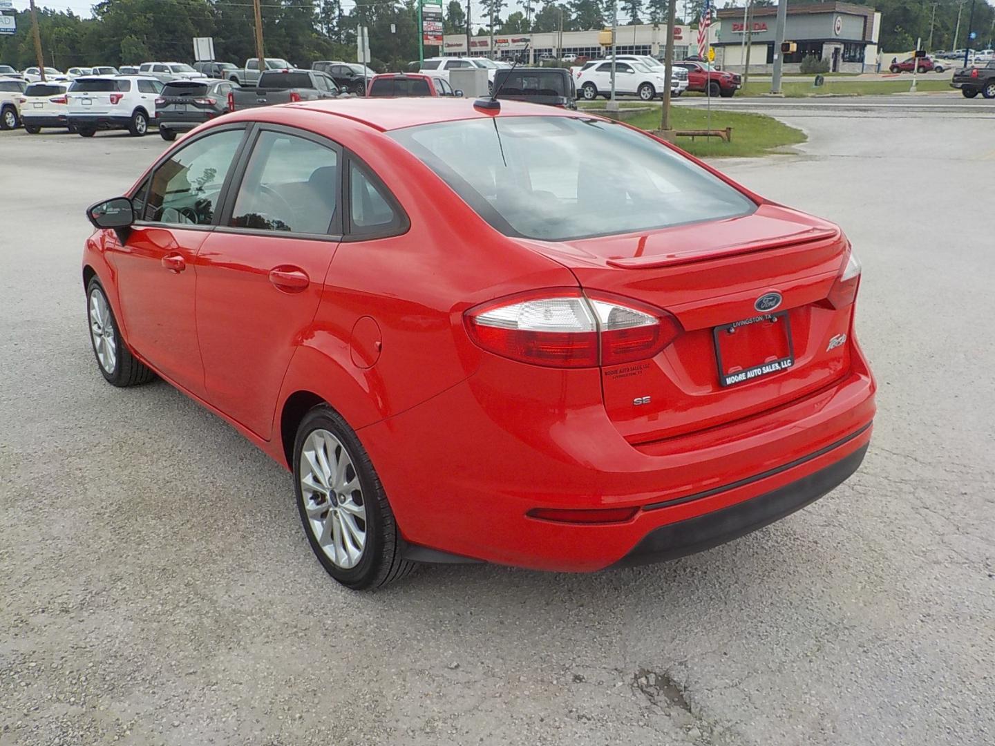 2014 Red /Charcoal Ford Fiesta (3FADP4BJ0EM) , Automatic transmission, located at 1617 W Church Street, Livingston, TX, 77351, (936) 327-3600, 30.710995, -94.951157 - WOW!! Need to check this one out for the price range it's in! You won't be disappointed! - Photo#5